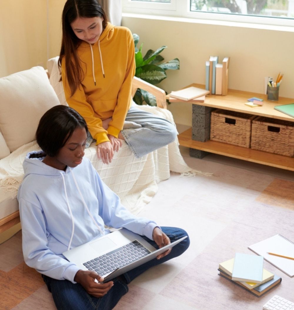  students on computer in dorm 